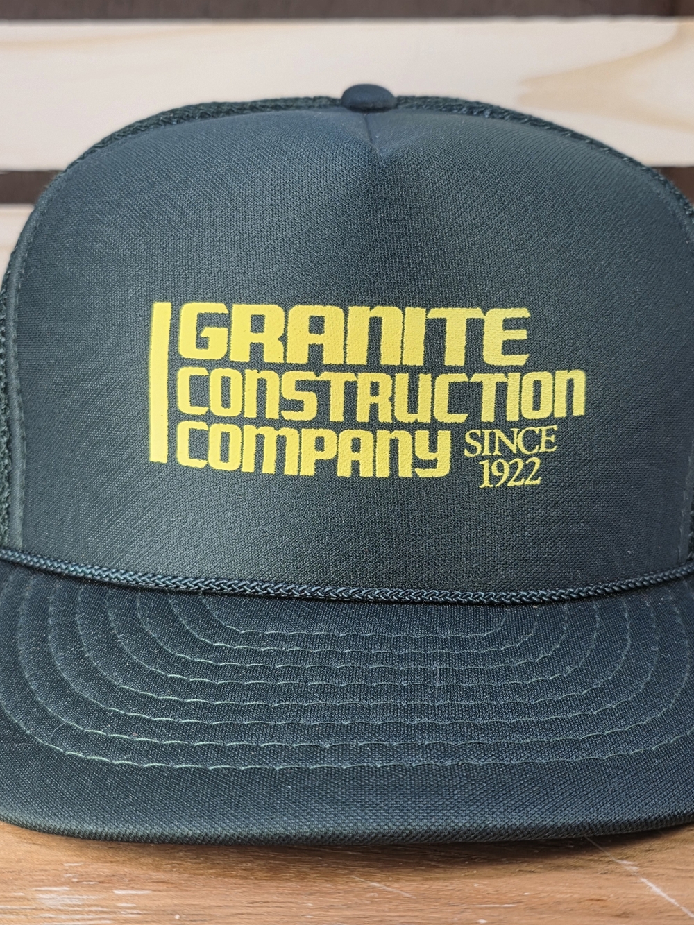Granite Construction Company Green Trucker Hat with Yellow Logo